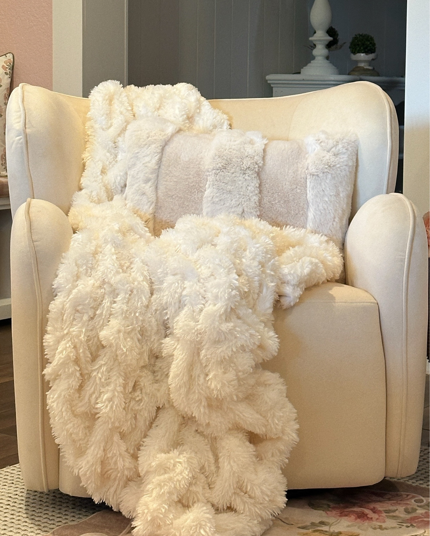 Velvet Swivel Chair. Love the shape and the wide seat. It’s so very comfy and looks so elegant. Modern style with soft lines. Cozy fur throw and pillow. Shop the sale now. Zgallerie home 

#LTKActive #LTKHome #LTKSaleAlert