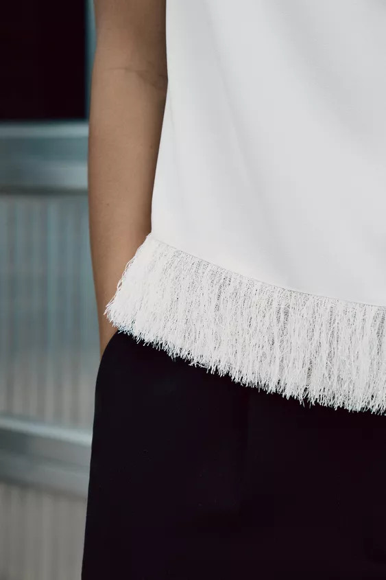 TOP WITH SHOULDER PADS AND FRINGING | Zara UK