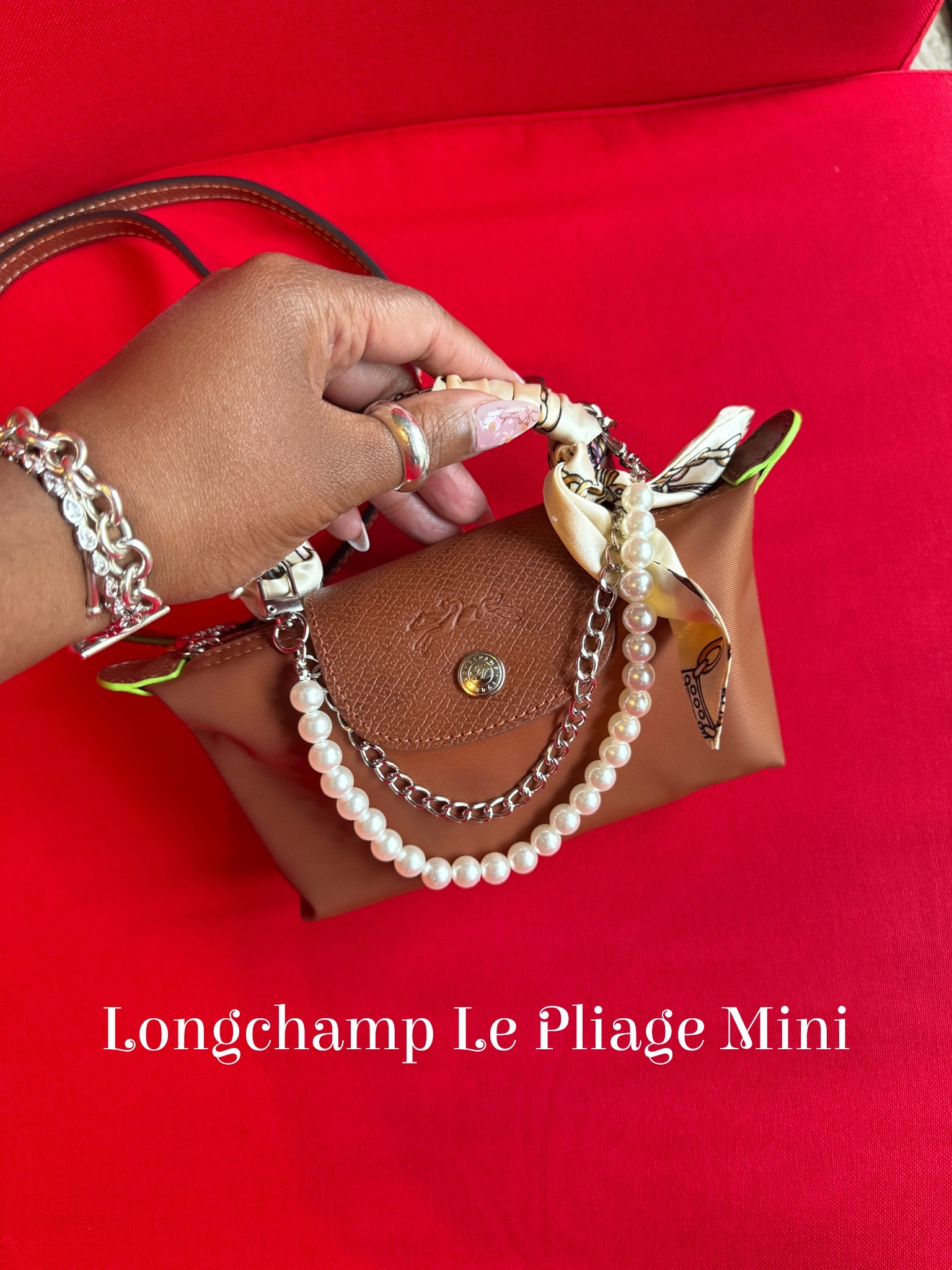 Perfect Mini Bag for the Summer! Longchamp Le Pliage Mini Handbag in Cognac with Silver Hardwear 👜

#LTKSummerEdit #LTKItBag #LTKStyleTip