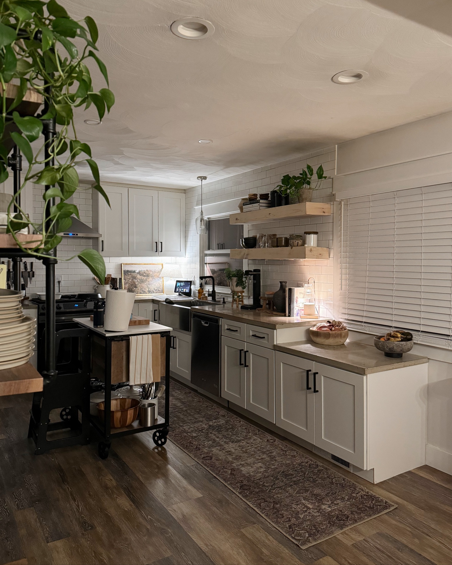 Our kitchen 🤎 shelving still needs stained again, so glad they aren’t super dark anymore! Linking our kitchen runner here and other decor I can 🫶🏼

Kitchen decor, kitchen runner, Loloi rugs, kitchen island, rolling island, kitchen shelf decor, shelves, candle warmer 

#LTKfindsunder50 #LTKhome