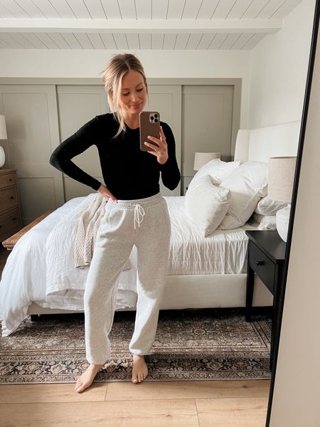 I’m loving this $19 Amazon long sleeve! It comes in sooo many colors. It’s buttery soft and the compression fit looks great with sweats or high waisted jeans. These Abercrombie sweats are amazing quality. I’m in XS and they’re a little long, so I tucked the cuff under. 
TOP: small
PANTS: XS

#casual #loungewear #athleisure #joggers #sweatpants 

#LTKsalealert #LTKstyletip #LTKfindsunder50