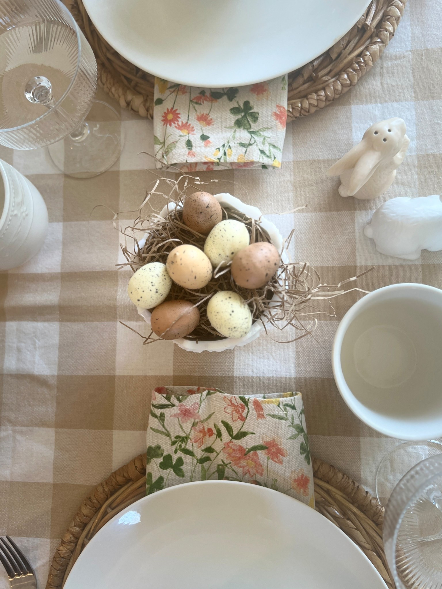 Lovely floral napkins make this neutral checked tablecloth sing. Perfect for an Easter brunch. Adorable bunny salt and pepper shakers add to the charm  

#LTKSeasonal #LTKHome #LTKFamily