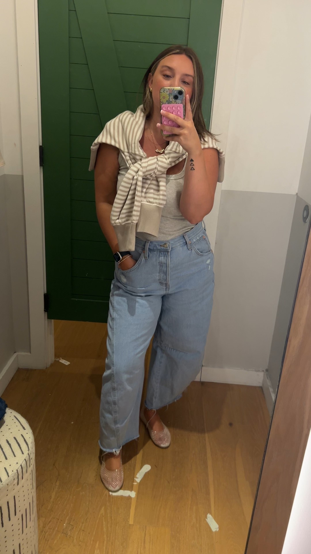 OOTD aerie fitting room edition, love this super cute striped sweater that is nice and Light weight and looks good on and just thrown on the shoulders! Paired with my barrel jeans from target that I live in and are under 40 dollars! 

#LTKStyleTip #LTKFindsUnder50 #LTKSaleAlert