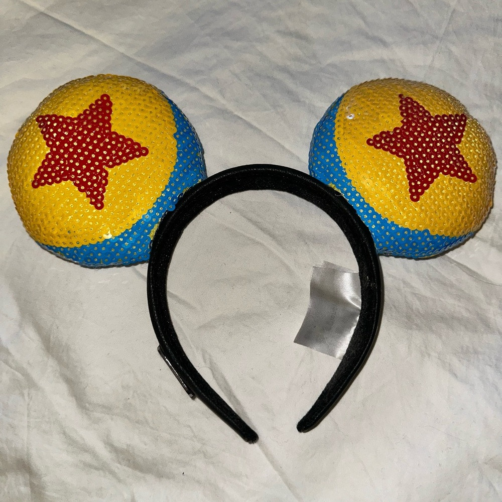 Disney Pixar sequin Headband in Red, Yellow, and Blue | Poshmark