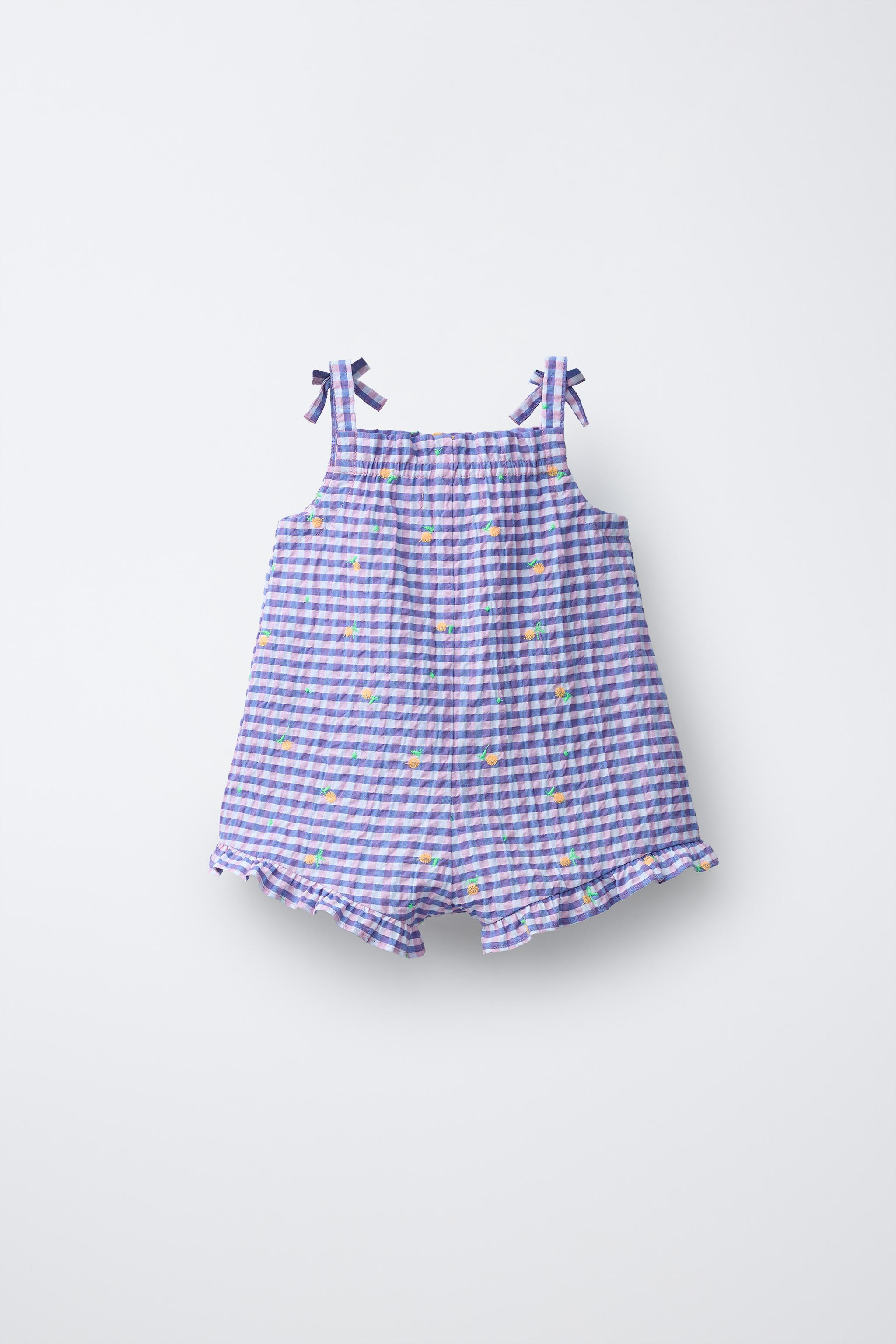 Kurzer Overall mit geradem Ausschnitt und Tr\u00e4gern mit Schleifendetail. Mit Fruchtstickerei u... | Zara DE