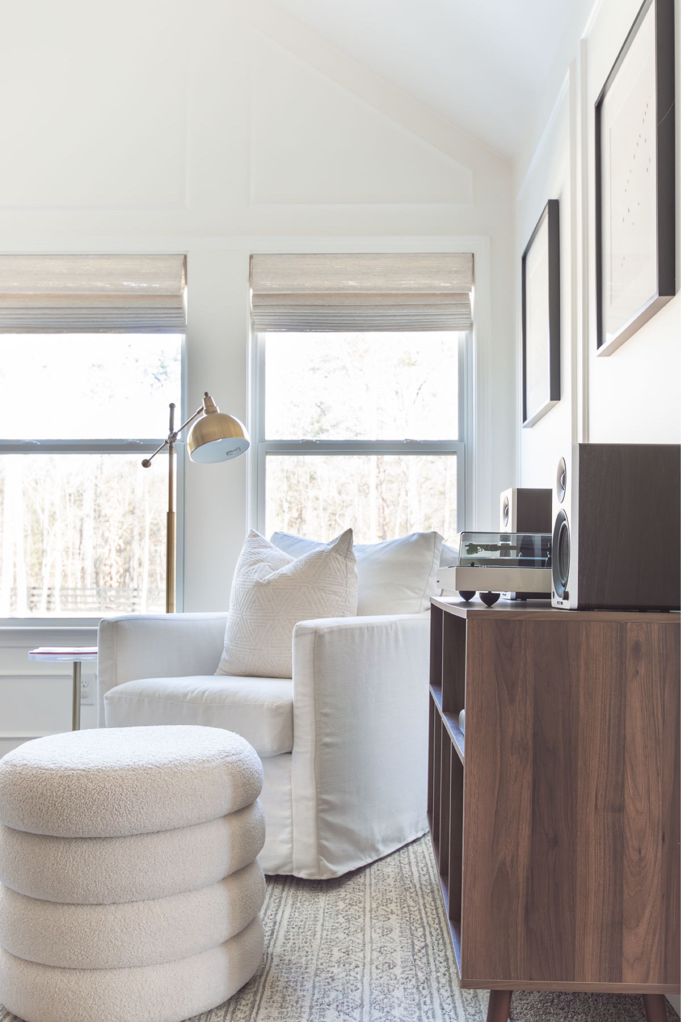 My little reading corner has evolved into a reading/listening corner, thanks to my new found passion of vinyl. I’ve added an open shelf cabinet, turntable and speakers to the space, along with an acrylic vinyl shelf to hold the “now playing” album sleeve. home decor sitting room decor reading nook vinyl storage record album storage area rug boucle storage ottoman floor lamp wall art Wayfair find#LTKStyleTip 

#LTKSaleAlert #LTKHome
