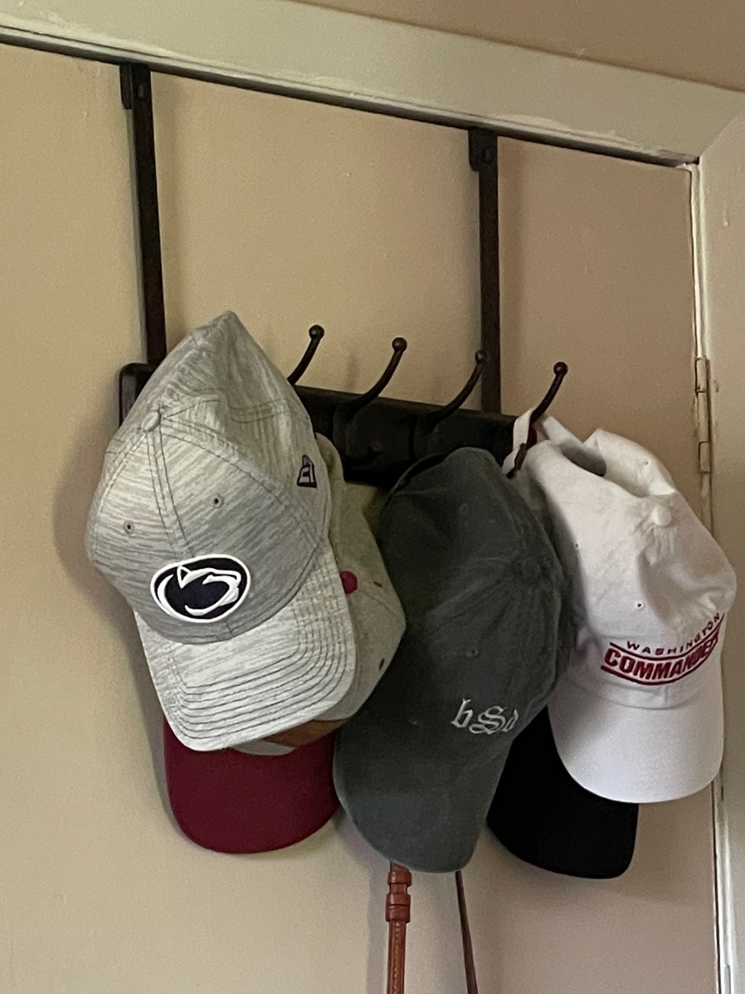 Behind the door storage! Perfect for hanging your hats

#LTKhome #LTKFind