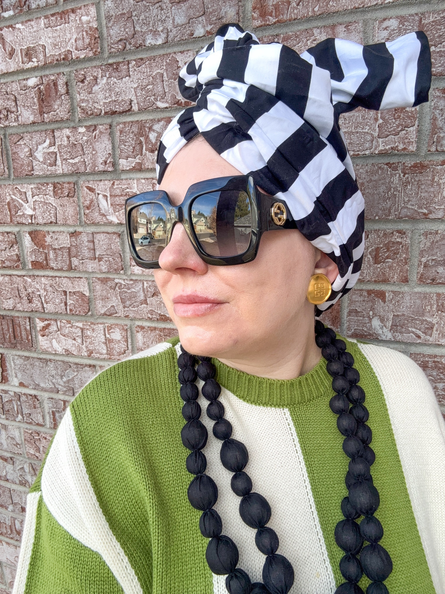 Tropical Luxe - Look 2
A curated style series

This sweater was love at first sight. The color. The stripes. The little fringe detail….I had to have it. It’s one of these statement pieces that seemingly goes with absolutely everything, as well. It comes in navy also - and I’m legit tempted. I’m loving this color green for 2026, though, so it won out.  Fit is oversized and suuuuper comfy.

If I had to pick my favorite season it would absolutely be RESORT! Okay, so it’s a clothing season and not a weather season- fine, be more specific with your questioning next time 😉 . But truly, if I could only wear one type of clothing again it would be beach-ready resort pieces. Too bad I live in a land-locked state. lol

Sweater - Simon Miller
Scarf/turban - Twisturban by Römer Millinery 
Necklace - Dillards
Bag - Vintage
Pants- (thrifted) Pretty Little Thing
Shoes - Dillards
Sunglasses - Gucci
Earrings - Vintage Givenchy
Bracelet - Vintage J Crew
Ring - Rocksboxx

Comment SHOP below to receive a DM with the link to this post on my LTK ⬇ https://liketk.it/5Zquc #ltkseasonal #ltktall #ltkootd

#LTKSeasonal #LTKSaleAlert #LTKTravel