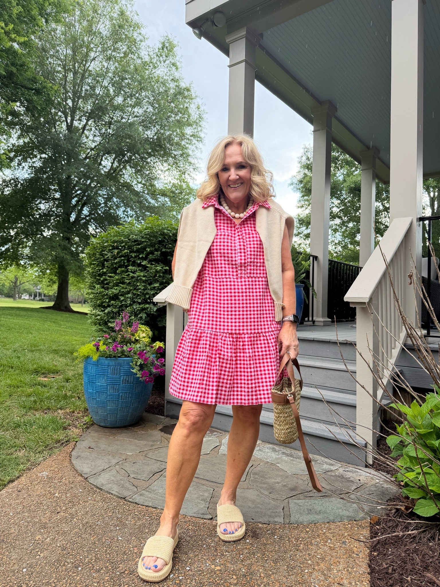 A pink gingham dress is always a summer favorite🫶🏻 Easy, playful, and so cute styled with raffia sandals, a woven bag, and a lightweight sweater over the shoulders for cooler evenings.

#LTKootd #LTKSeasonal #LTKOver40
