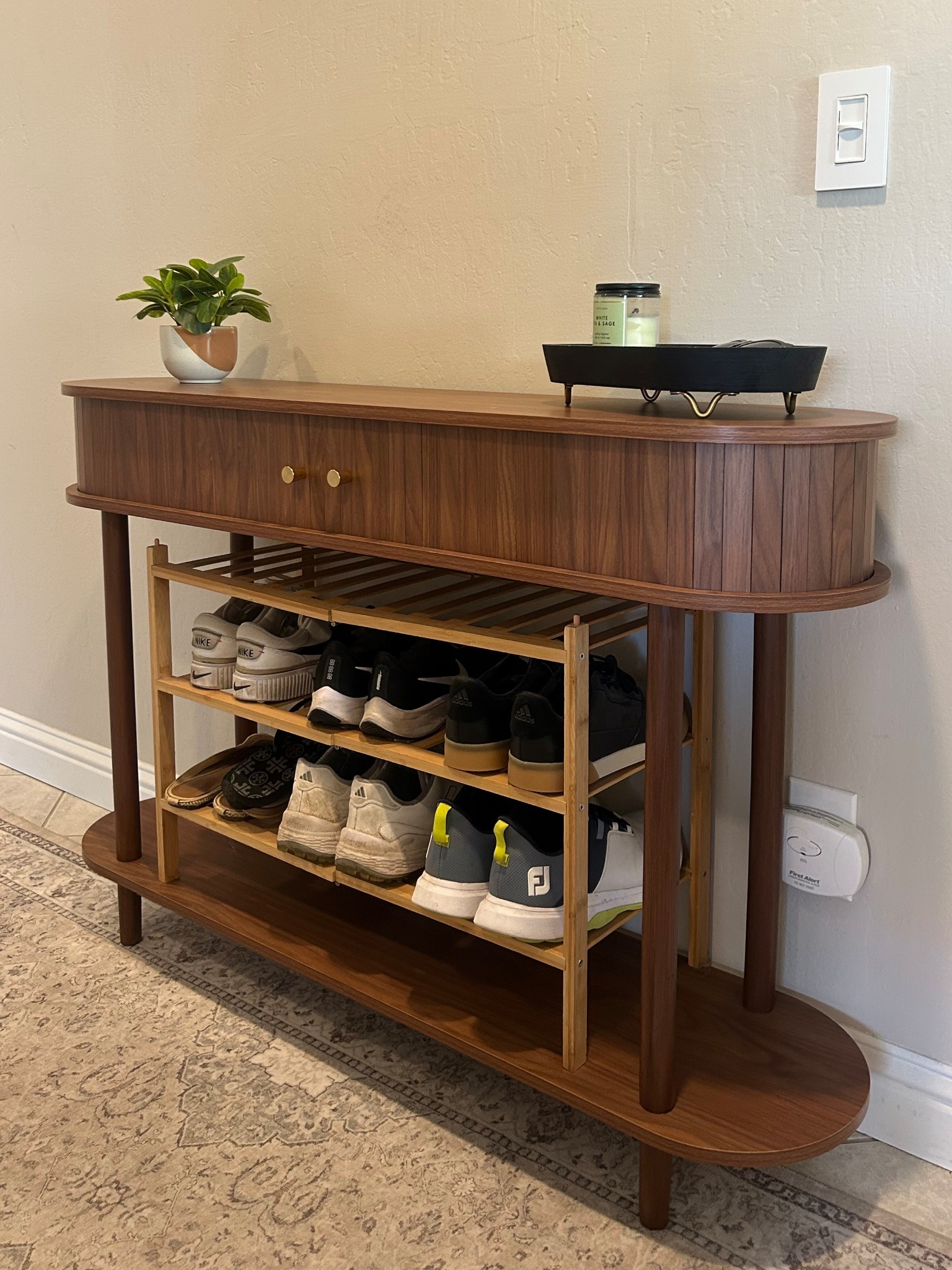Amazon home purchase! Bought this entryway table that fit our shoe rack-still not sure I’ll keep the shoes there, but I love the table and how it adds a nice touch to the entrance.

#LTKStyleTip #LTKHome