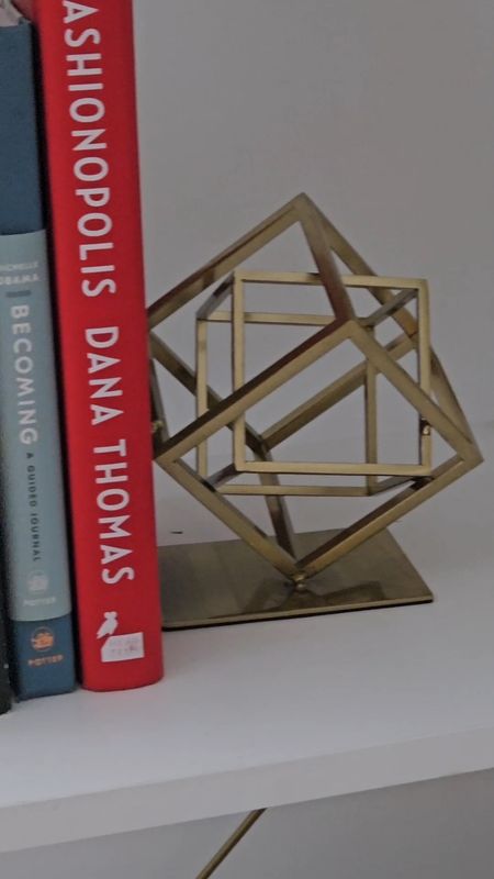 Add bookends to any bookshelf. It keeps everything tight and plus, there's many options to choose from. I went with this gold set from Amazon. 

#LTKhome #LTKfindsunder50 #LTKMostLoved