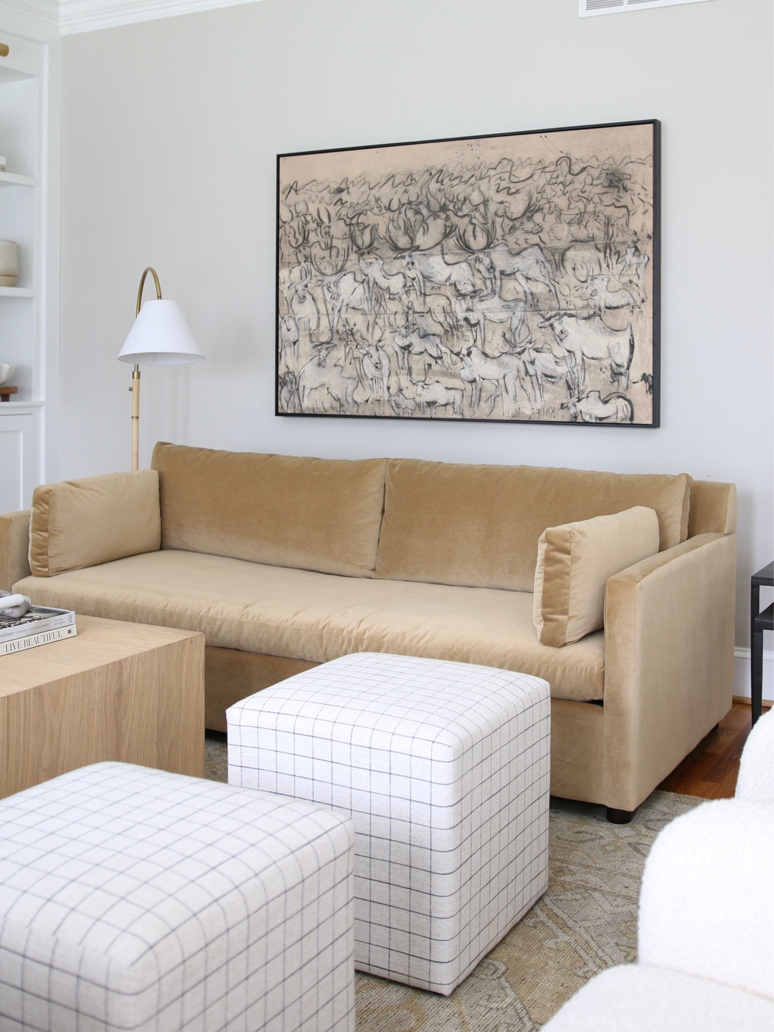 Migration - Kader Boly from The Vintage Rug Shop, square coffee table, Marin sofa, striped ottoman

#LTKstyletip #LTKFind #LTKhome