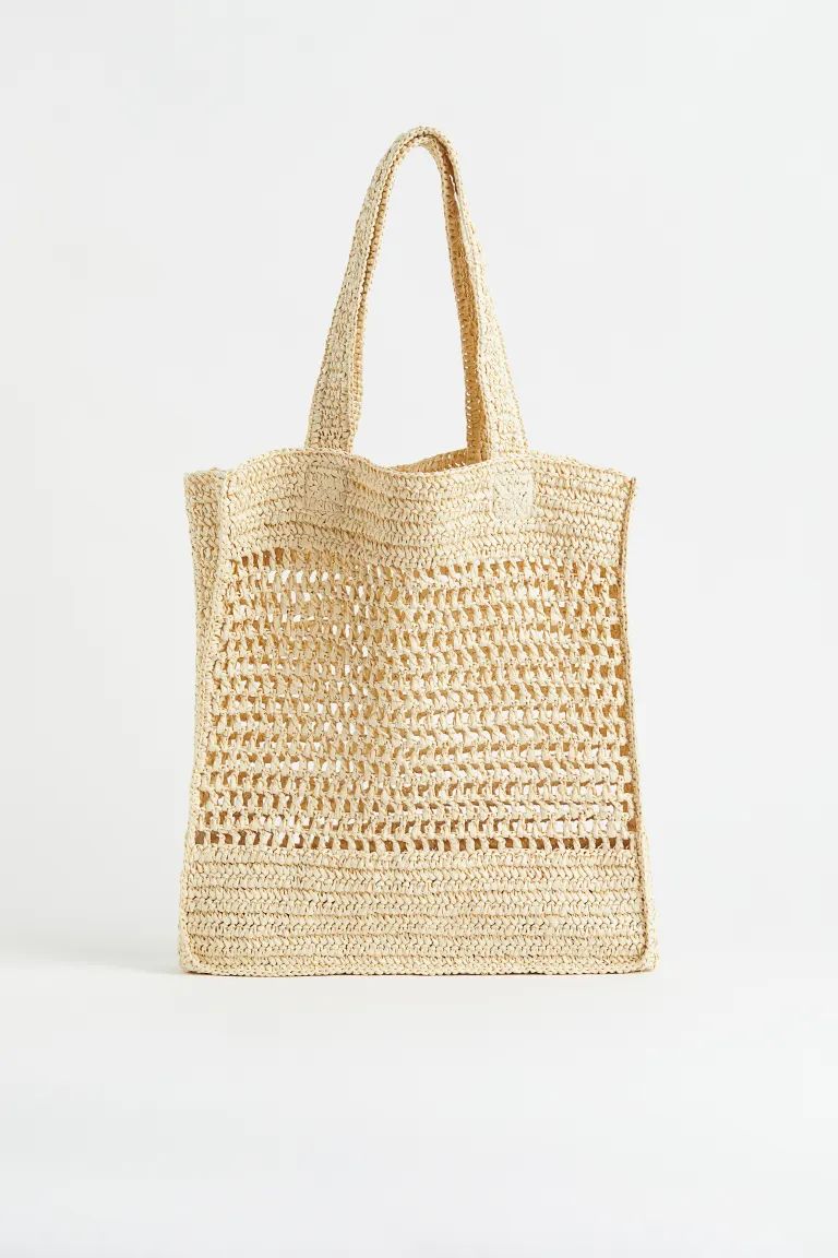 Crochet-look shopper in braided paper straw with two handles at top. Unlined. Depth 3 in. Height ... | H&M (US + CA)