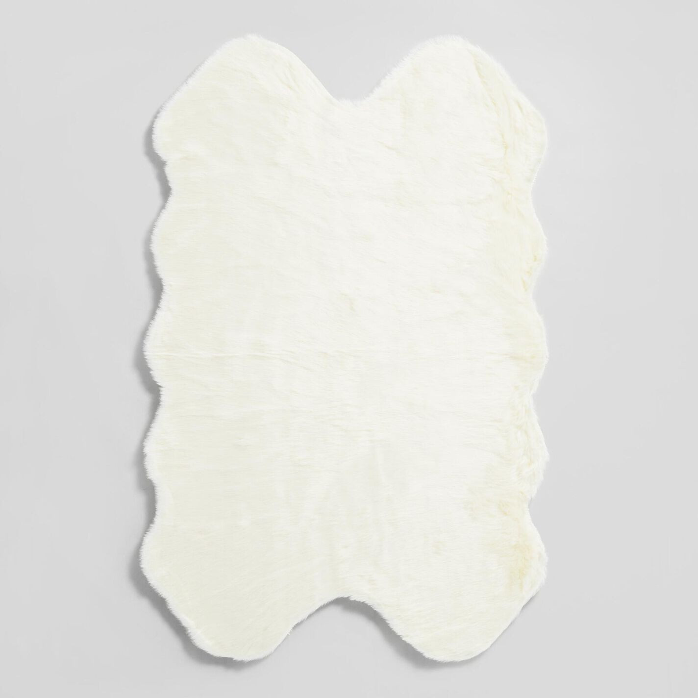 Ivory Faux Sheepskin Area Rug | World Market
