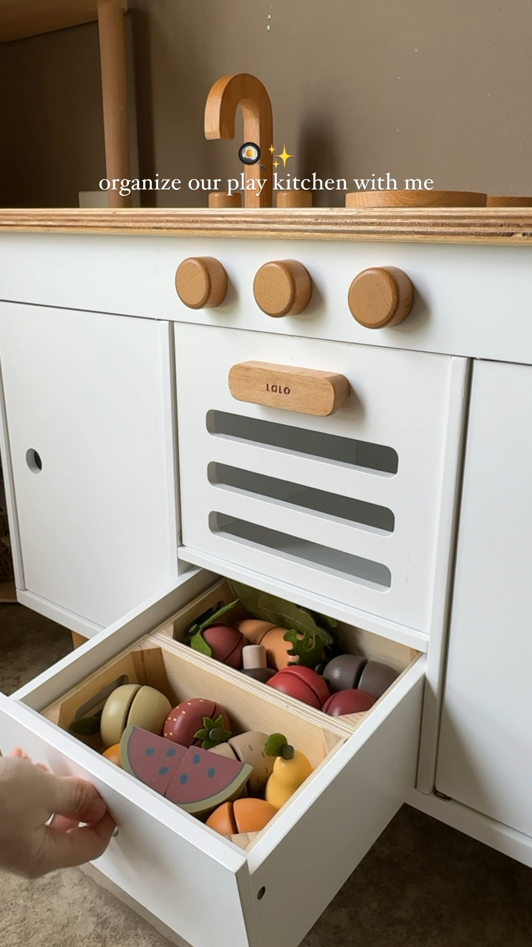 am I the only parent who finds organizing their kids play kitchen strangely therapeutic?🙈 there’s just something about arranging tiny utensils and wooden food that’s so satisfying 🍊🫧 #momreels #motherhood #momcomedy #playkitchen #montessoritoddler #montessoriplay #woodentoys 

#LTKkids #LTKhome #LTKfamily