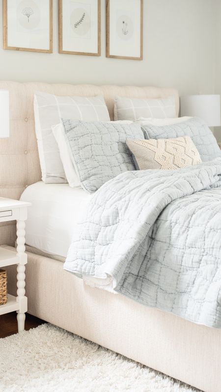 Bedroom refresh with light blue quilt, decorative pillows, tuft headboard, white nightstand, and more coastal style home decor

#LTKfamily #LTKhome