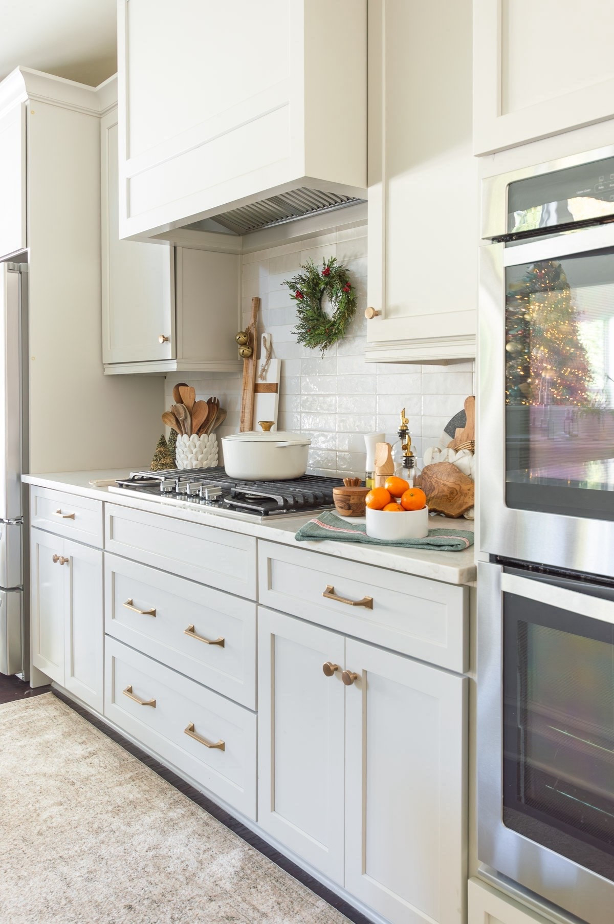 I don’t add very much Christmas decor to my kitchen, but I do like to add a few touches to infuse a little holiday in the heart of the home. Even small additions make a big difference! home decor Christmas decor Christmas kitchen decor woven counter stools agreeable gray cabinets white backsplash tile kitchen counter styling#LTKStyleTip

#LTKHoliday #LTKHome