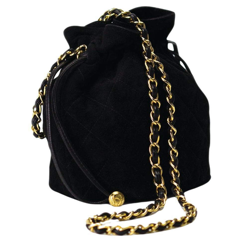 Chanel 1991 Vintage Drawstring Suede Mini Bucket Crossbody Shoulder Bag | 1stDibs