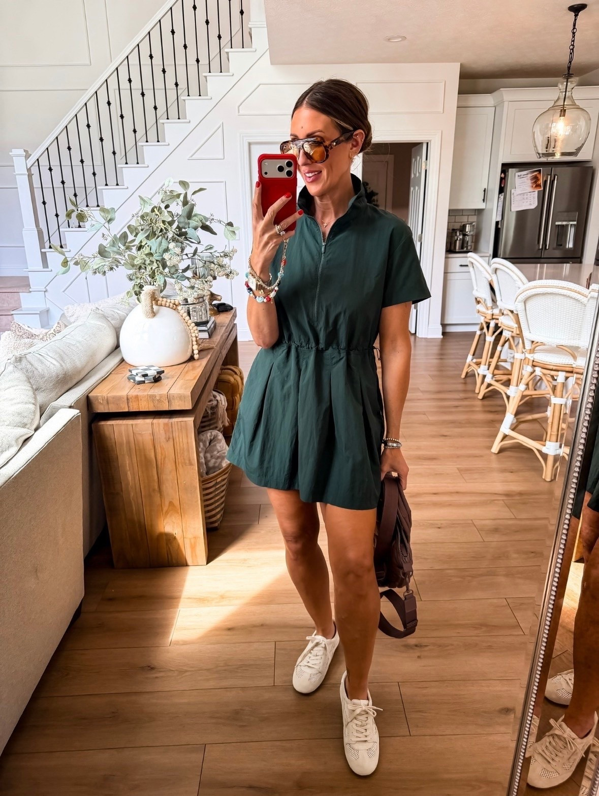 This sporty dress is one of my favorite throw on and go pieces. It has the look of a polished outfit but feels as comfortable as activewear. I love it paired with sneakers and a backpack for travel days, errands, sporting events, or anytime I want to be comfortable without sacrificing style.

athletic dress, sporty chic outfit, travel outfit, casual summer style, everyday dress, comfortable outfit, sneaker outfit, activewear dress, mom style, airport outfit, effortless fashion, summer wardrobe, themominstyle

#LTKActive #LTKmomlife #LTKdayinmylife