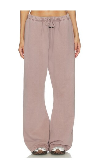Fear of God ESSENTIALS Signature Classic Fit Flare Sweatpant in Mauve. - size XS | Revolve Clothing (Global)