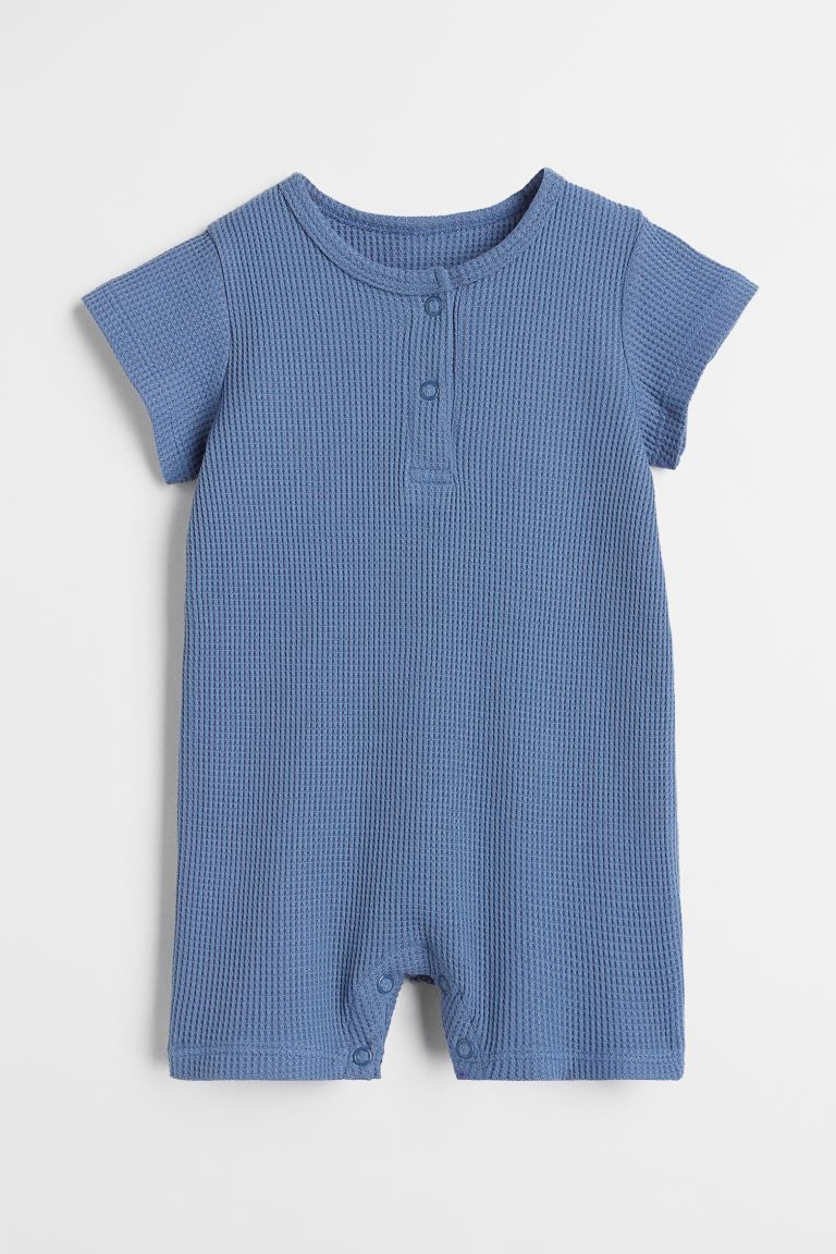 Conscious choice  Short-sleeved bodysuit in soft cotton jersey with snap fasteners at top and at ... | H&M (US + CA)