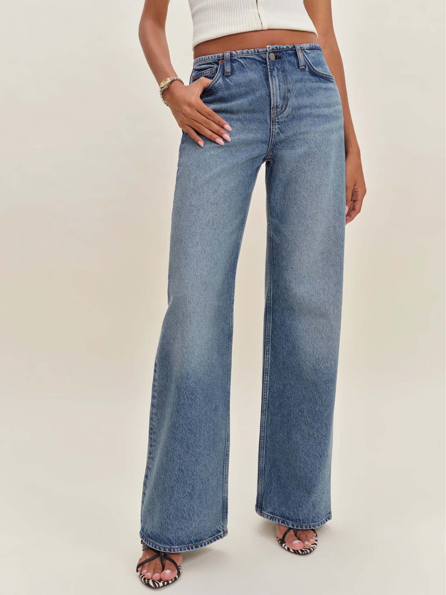 These super low cut baggy jeans looked beautiful on! Not too long - great with flats and heels. I’m normally a 25 I got a size 24.