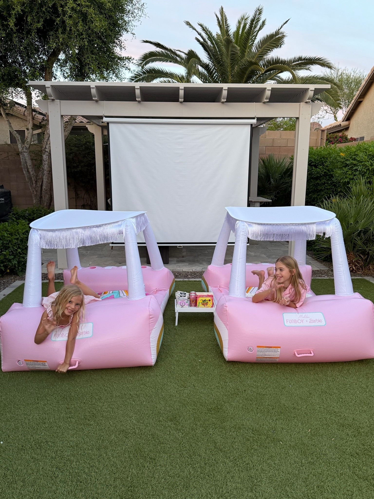 summer backyard movie night with my girls  💗 They love these @FUNBOY Barbie floats

#LTKdayinmylife #LTKHome #LTKKids