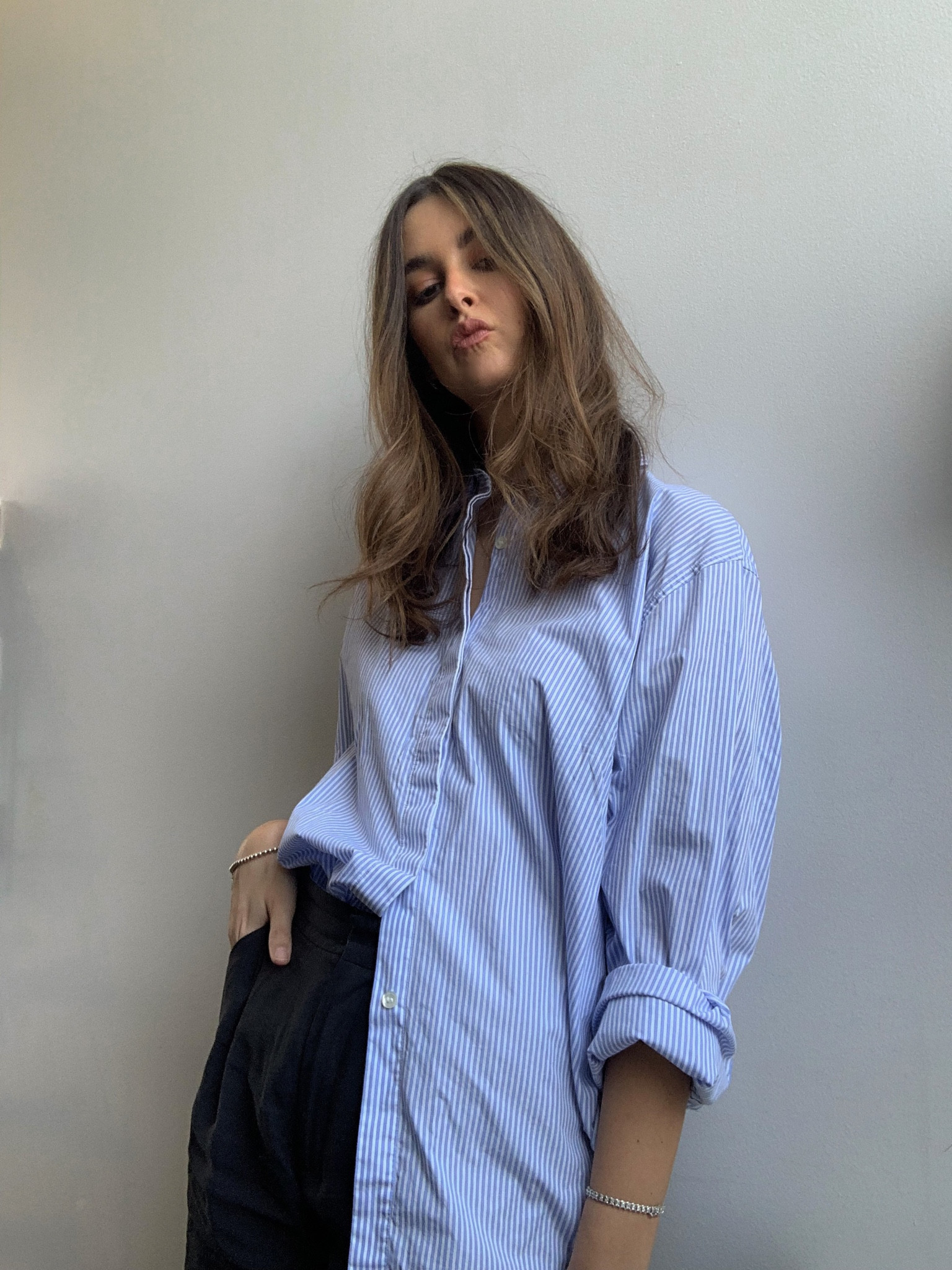 A blue striped shirt so versatile. Can be dressed up or dressed down. Also can be used as a layering piece under a vest, a blazer, a jacket or over a t-shirt or cami.

#LTKworkwear #LTKFind #LTKstyletip