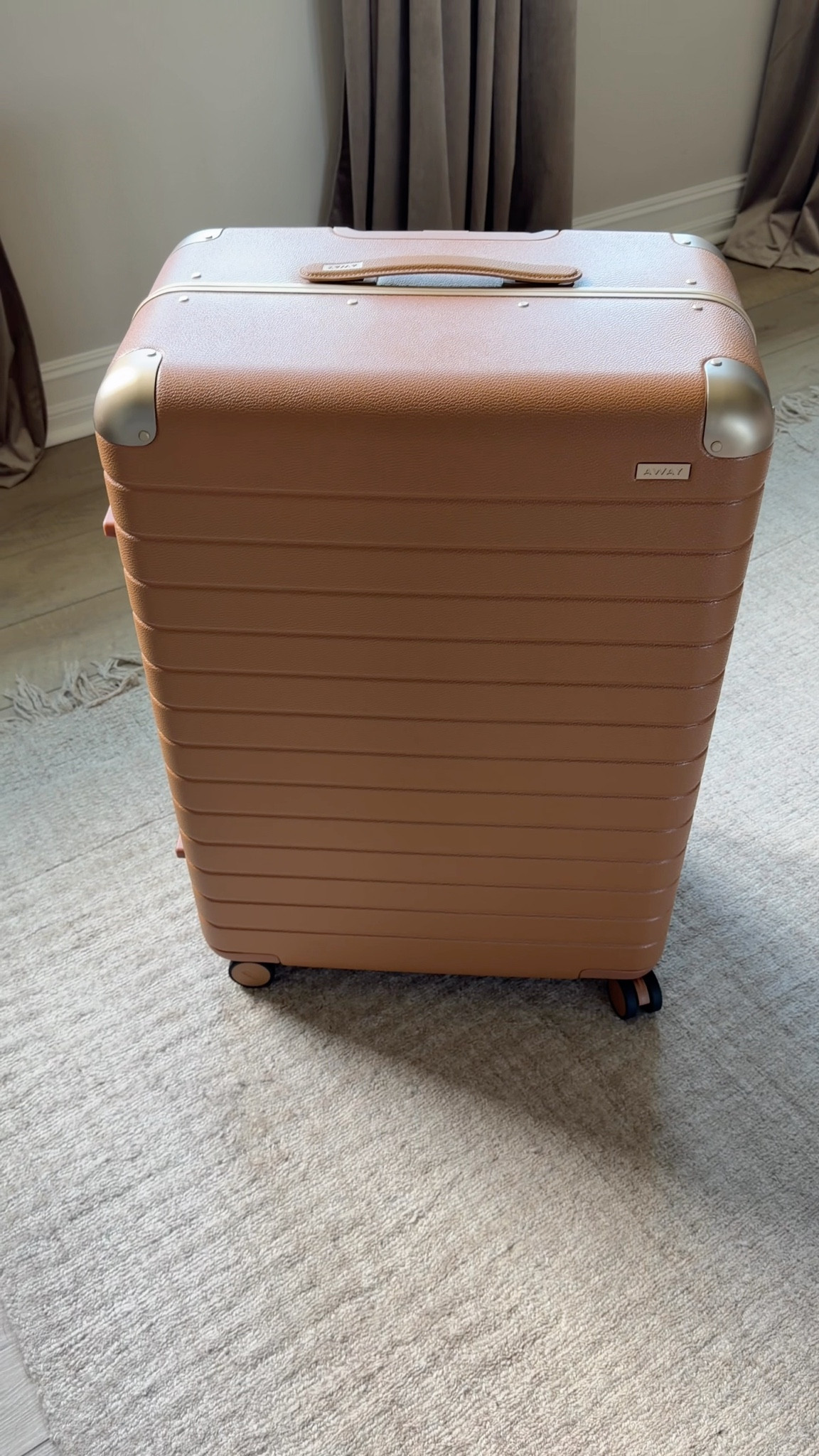 This is literally the most beautiful luggage I’ve ever seen! I bought the large as well as the bigger carry-on. I also bought a clear suitcase protector to try to help protect it from too much damage.

#LTKTravel