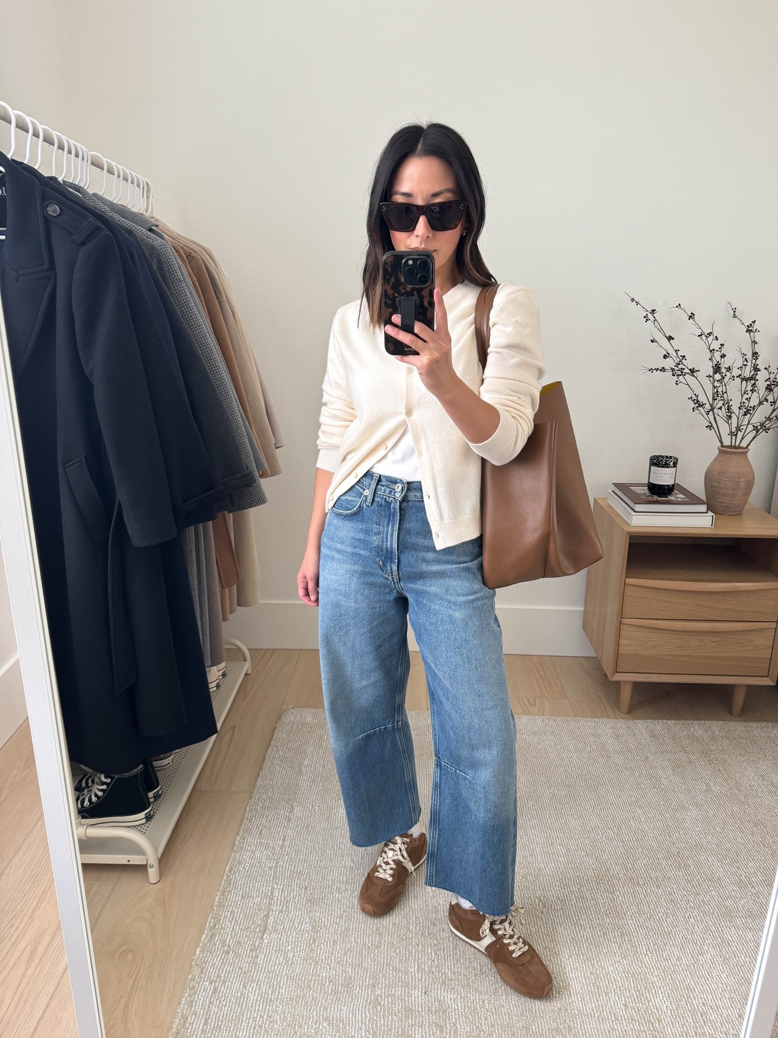 Casual workwear with jeans. 

Aritzia cardigan small
Everlane tee medium
Citizens of Humanity Miro jeans 24. Run big. Cut hems
Larroude sneakers 6, run small
Mansur Gavritel tote
Celine sunglasses

#LTKOver40 #LTKWorkwear #LTKPetite
