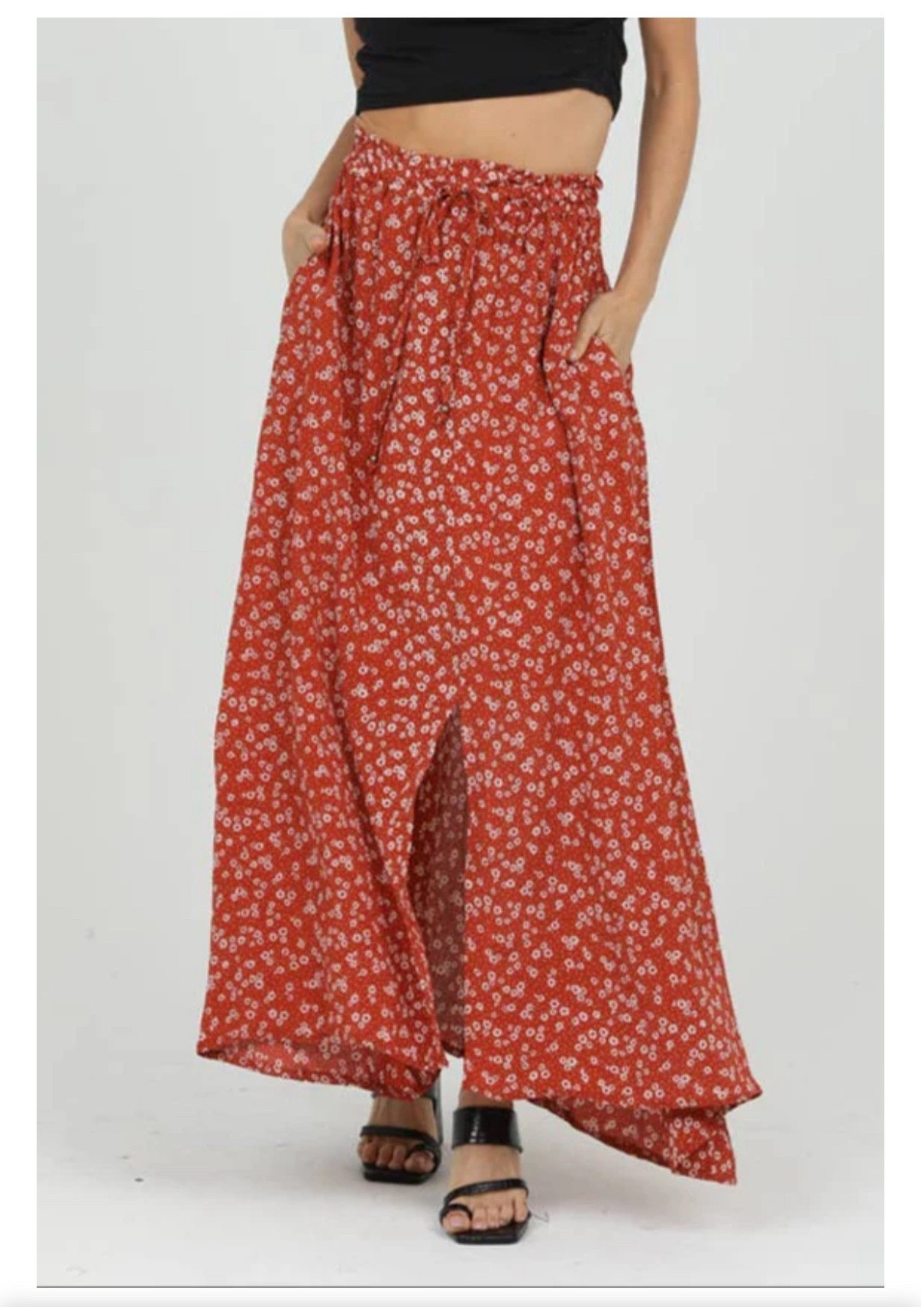 LOVE this skirt. It’s breezy, feminine and I really love pairing high waisted maxi skirts with crop tops or a fitted top. It could be cute even in winter with a bodysuit and boots! 

#LTKStyleTip