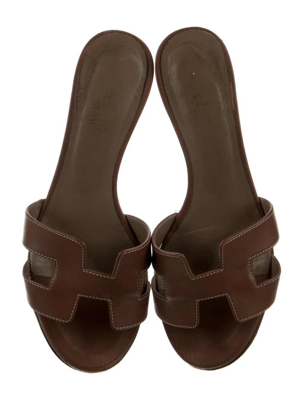 Oasis H Logo Slides | The RealReal