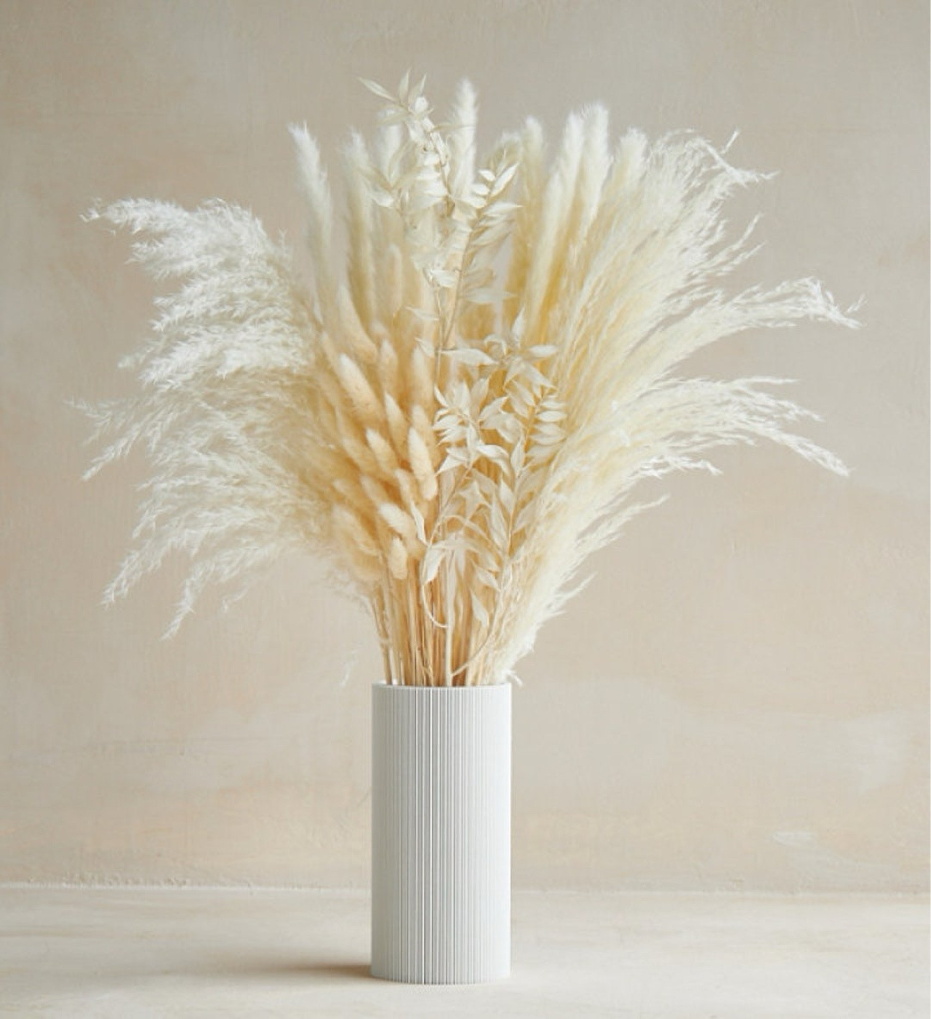 Bring a soft, natural touch into your home with this versatile dried flower set, featuring wheat, eucalyptus, bunny tails, pampas grass, and rice flower. Designed for effortless styling, you can arrange all stems together for a full, statement look or separate them into smaller vases throughout your space. With its airy texture and neutral tones, this long-lasting arrangement adds warmth and dimension—no watering needed, just timeless beauty that lasts all year. #ltkhome #ltkdecor #driedflowers #pampasgrass #neutraldecor #bohodecor #homestyling #cozyhome #sustainableliving

#LTKSeasonal #LTKWedding #LTKHome