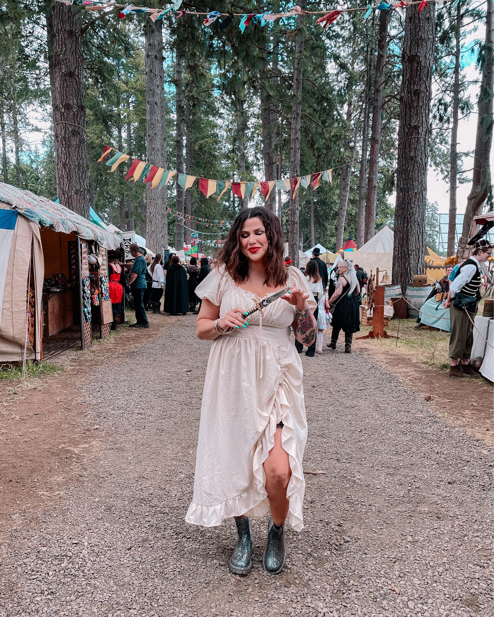 Baby’s first Ren Faire ⚔️ I am OBSESSED with this dress + I need to find every excuse in the book to wear it. I was going for pirate vibes but then I quickly felt like Poppy from the Blood and Ash series. But you could totally wear this for anything renaissance or fae! It’s so comfortable, flattering, and breastfeeding friendly. 

I added some other cuties I was eyeing as well! Happy shopping, fellow fantasy freaks 🤓  

#LTKSeasonal #LTKMidsize #LTKFindsUnder50