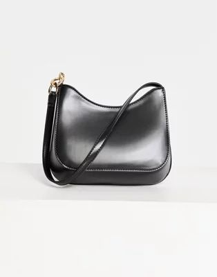 ASOS DESIGN curved shoulder bag with chain link strap in black | ASOS (Global)