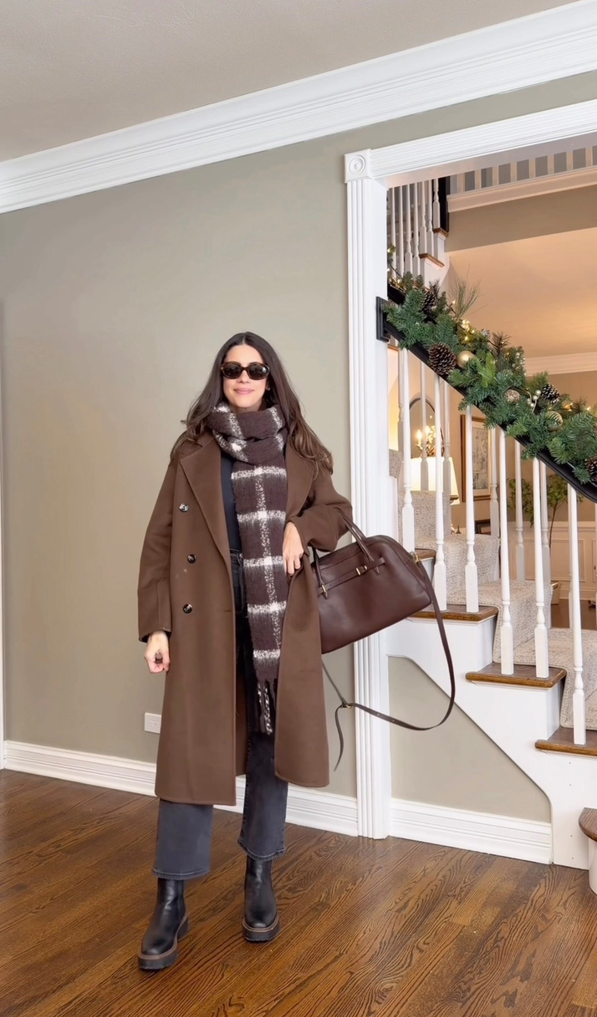 Styling Chelsea boots for winter with jeans that hit at the perfect length for ankle boots (I’m 5’6”). This is an easy, polished winter capsule outfit featuring a classic black top, a cozy wool coat, and a scarf—simple pieces that always look elevated. A go-to chic winter outfit that works for everyday wear and mom life.

Sizing details:
Jeans: true to size
Top: size Medium
Wool coat: size Small
Chelsea boots: run true to size

#LTKSeasonal #LTKFindsUnder100 #LTKFindsUnder50