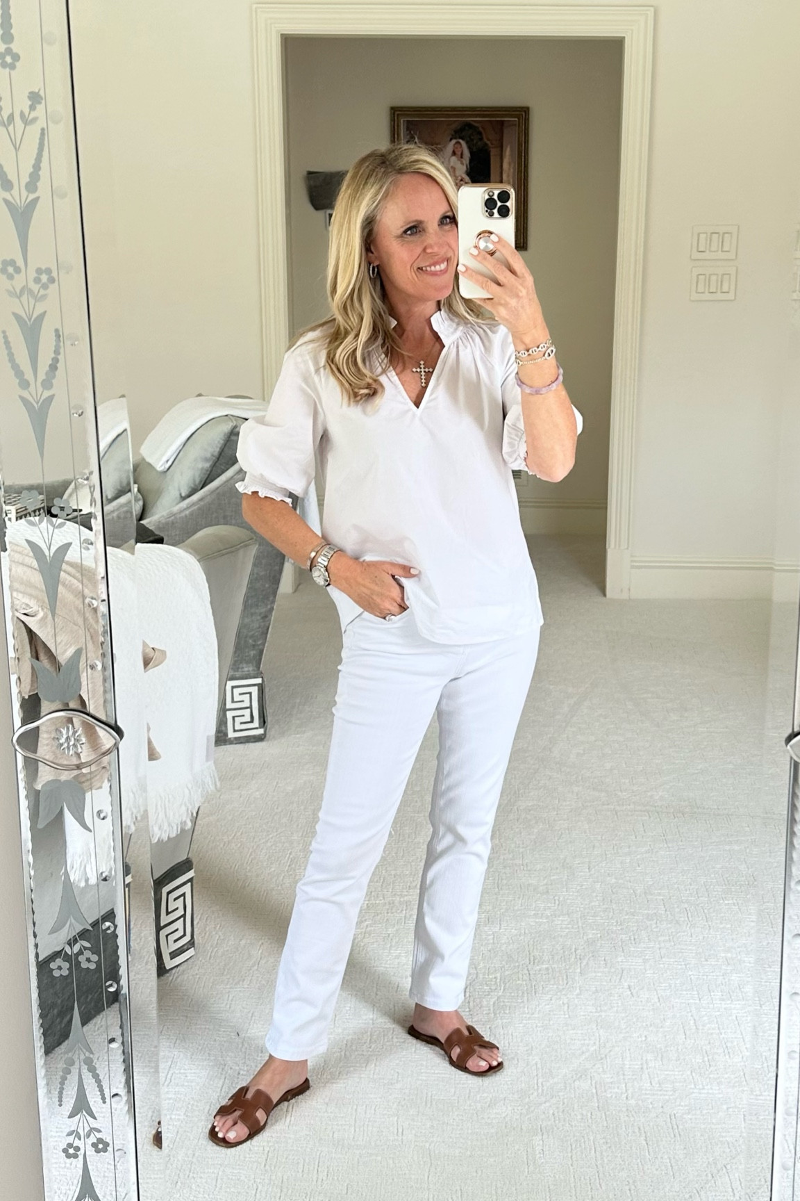 The best white shirt for spring! This fabulous top comes in. Lots of colors! That’s true to size I’m wearing XS  

#LTKunder100 #LTKSeasonal #LTKFind