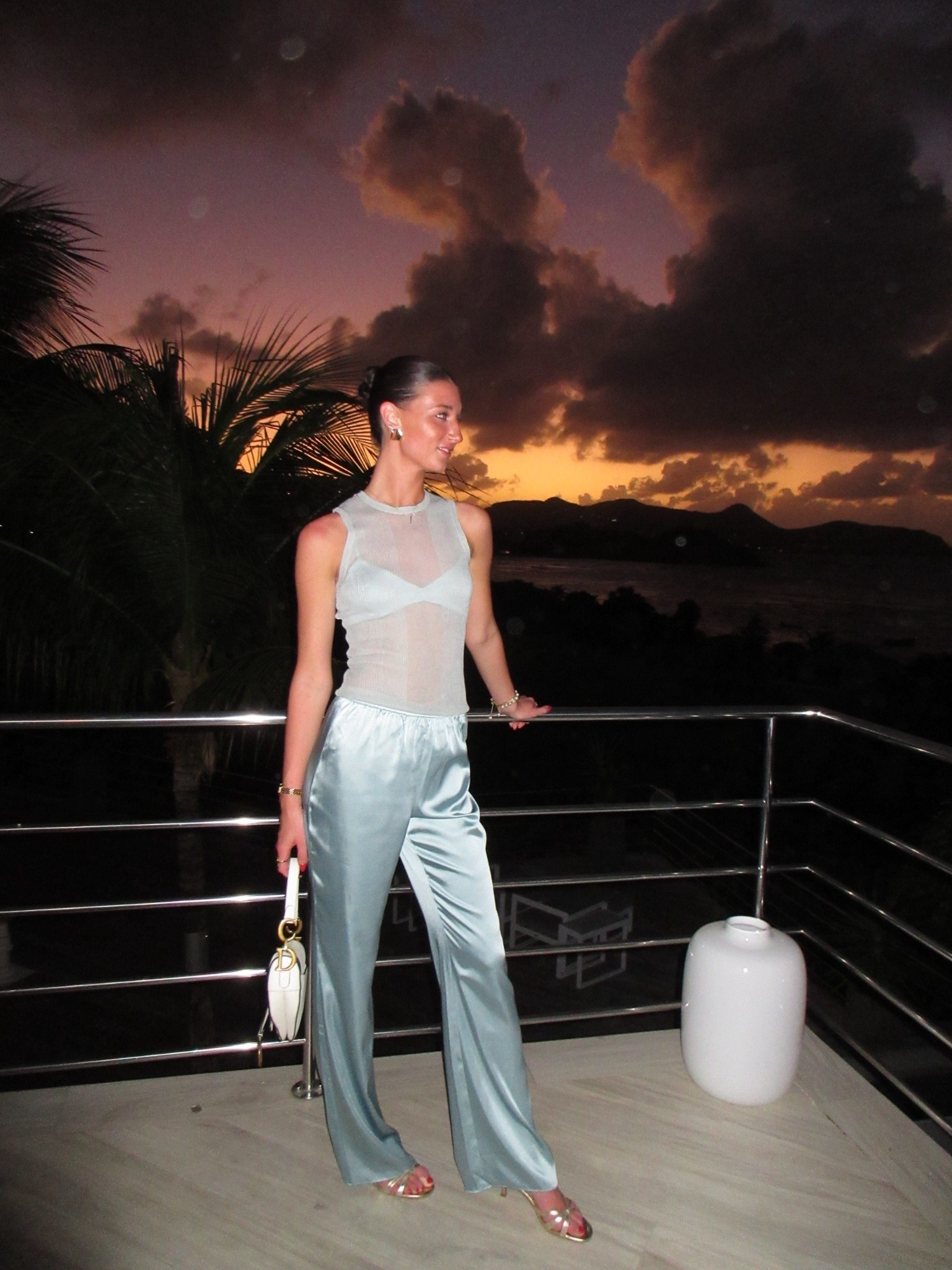 St Barths outfit, dinner outfit, spring break, outfit, Cabo outfit, silk pants set, knit tank, silk bralette, slick back bun outfit, 3 piece set, vacation outfit, travel outfit, beach dinner outfit, Saint Barthelemy dinner outfit, sunset beach outfit picture 

#LTKootd #LTKTravel #LTKTall
