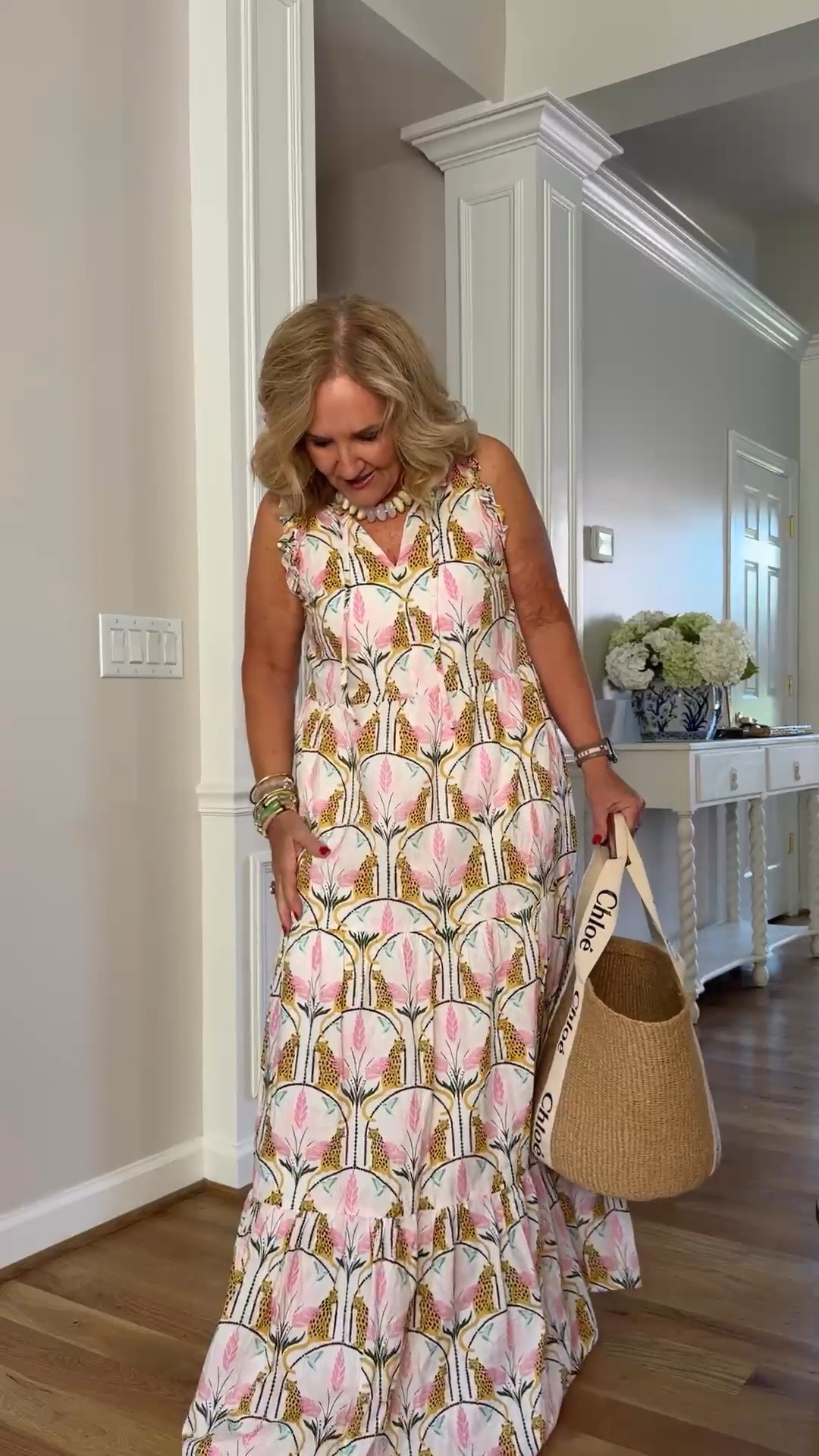 Tap the bell 🔔, heart ❤️ this post, and save for later!

This floral maxi dress is made for easy summer dressing. The flowing silhouette and pretty pink, coral, and sage print feel feminine and polished, while a woven tote makes it perfect for vacations, lunches, and warm-weather occasions.

Fit note: I'm wearing a small

#LTKSeasonal #LTKootd #LTKOver40