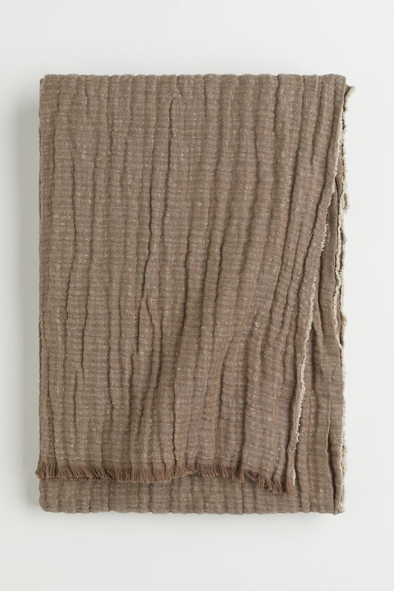 Crinkled linen-blend blanket | H&M (UK, MY, IN, SG, PH, TW, HK)