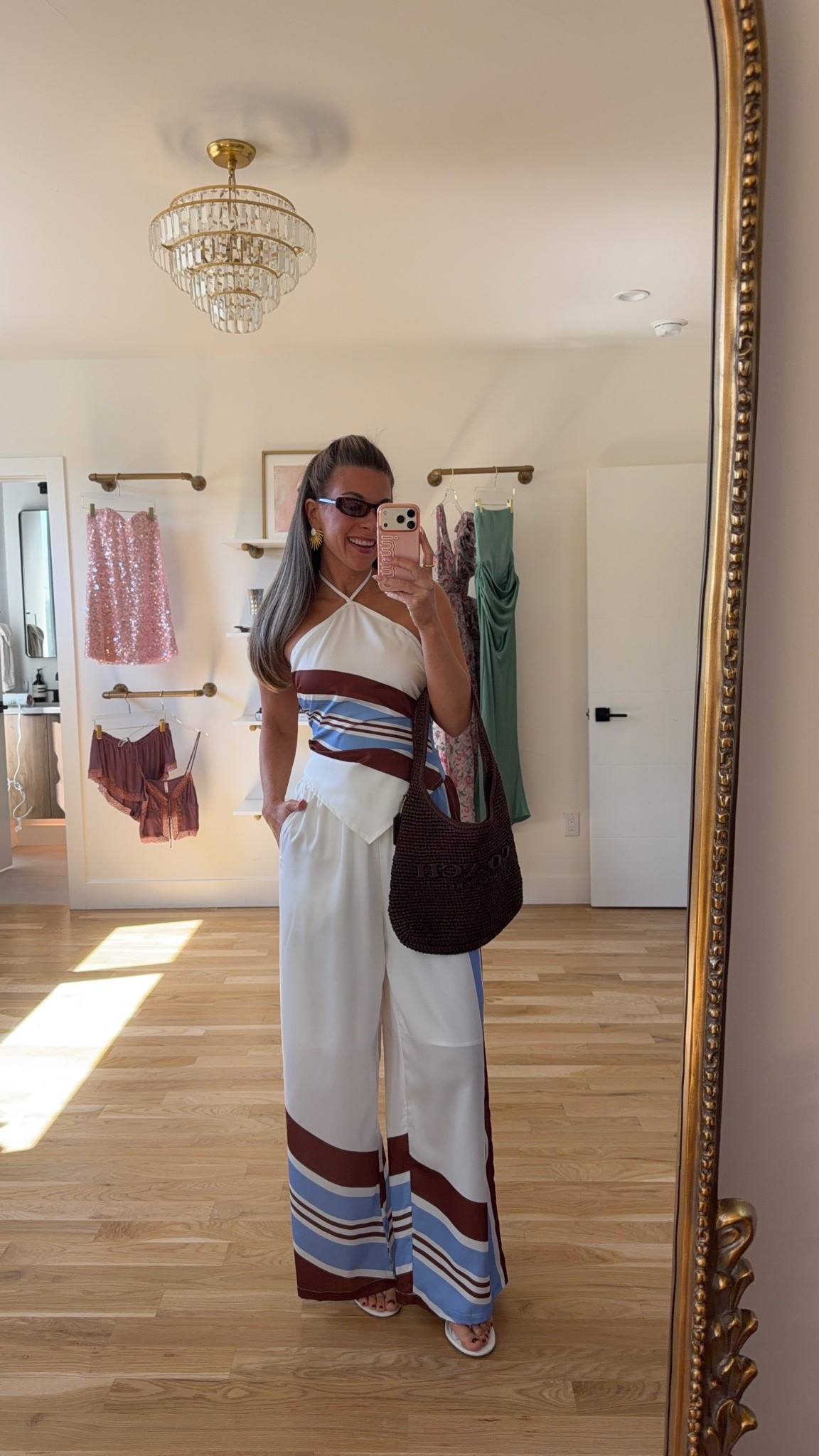 cupshe white halter top with brown and blue stripes, paired with matching wide-leg pants resortwear under $55 for every destination 🌴🍹

Cupshe code: chic
vici: emerson30

I’m 5’4” and wearing my usual smalls in all!

swim, bikini, one piece swimsuit, summer swim, cover up, resortwear, resort outfits, vacation outfits, vacation dresses, beach vacation outfits, summer vacation outfits, tropical vacation outfits, vacation outfit ideas, summer dresses, casual summer outfits, summer outfit ideas, everyday summer outfits, summer fashion finds

#LTKSeasonal #LTKootd #LTKTravel