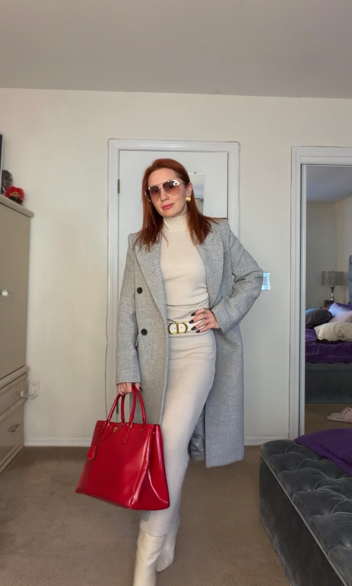 Effortless power dressing with a timeless, feminine touch.

This neutral monochrome look is all about clean lines and confident elegance. A sculpting knit dress layered with a tailored gray wool coat creates a sleek, elongated silhouette, while white boots and gold accents keep the look refined and polished. The bold red statement bag adds the perfect pop of color — powerful, feminine and unforgettable.

Perfect for city days, business lunches, coffee meetings and everyday luxury moments.

⸻



neutral monochrome outfit, gray wool coat, beige knit dress, white knee high boots, quiet luxury style, city chic look, elegant winter outfit, timeless fashion women, capsule wardrobe outfit, red statement bag, classy everyday look, sophisticated outfit women, feminine business casual, minimalist luxury style, modern chic outfit

#LTKootd #LTKOver40 #LTKdayinmylife