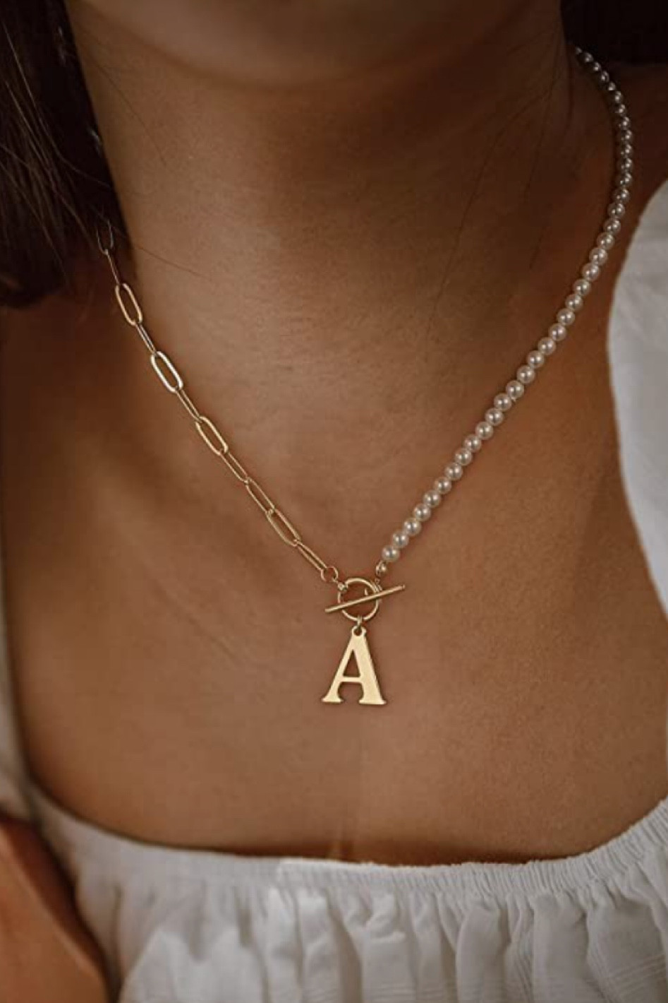Prettiest initial necklace 🤎 silver and gold initial with chain and pearl chain

#LTKstyletip #LTKunder50 #LTKfamily