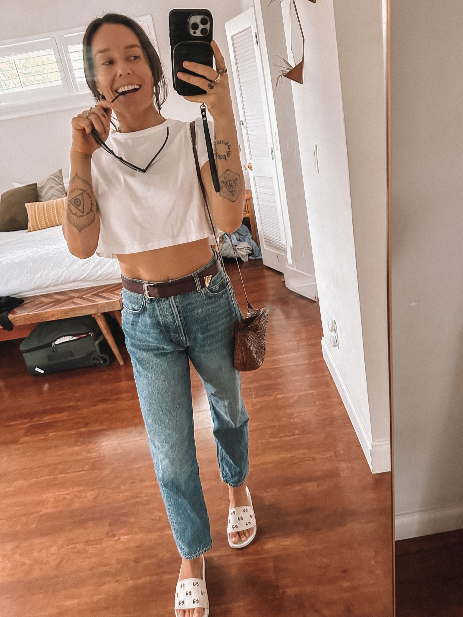 Classic white cropped tee + reformation jeans are always a good idea.
Obsessed with these rubber Gucci slides for casual, everyday looks. 
Belt is vintage Gucci & bag is vintage Bottega...linking other options for ya 🫶 

#LTKfindsunder100 #LTKGiftGuide #LTKstyletip