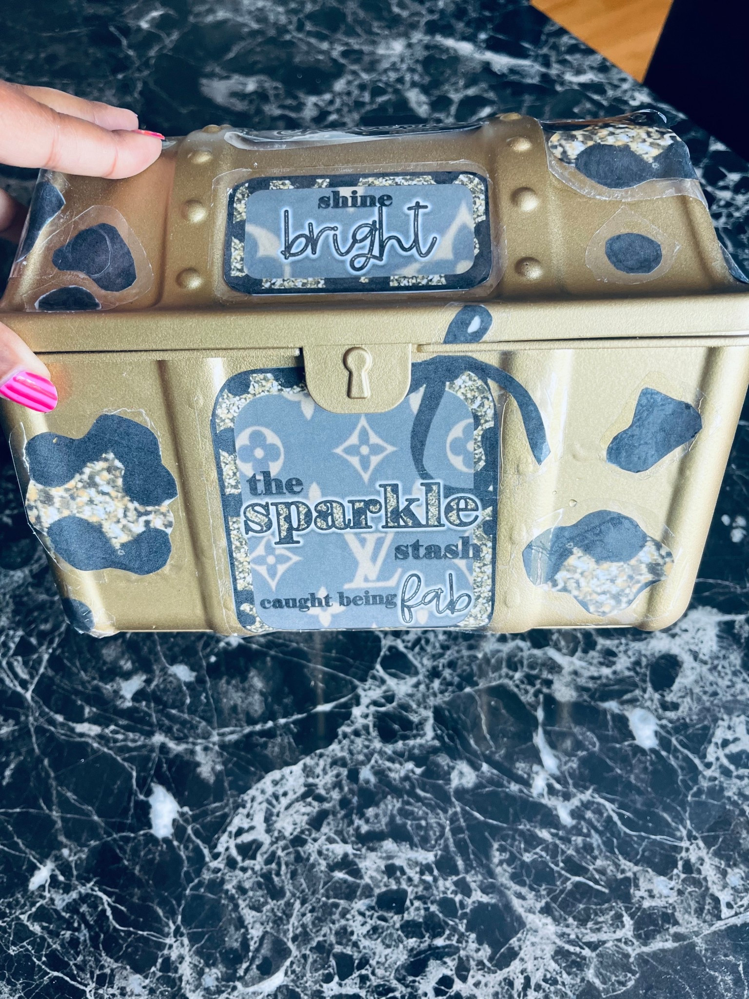 I don’t know what it is?.. but this box is a SUPERSTAR 💫SHINE BRIGHT, SHINE FAR — be a STAR ⭐️ OH MY GLAM!
CHIC this out! I saw @pompomandfringes make a kindness chest and knew I needed a SPARKLE STASH — cheetah style, of course. 🐆✨

I’ve always had a treasure box in my classroom, but this year she got a GLOW UP. my hubby and I got this from 
@walmart for only $4.97 and it’s tax free week, he spray painted it gold for me with @krylonbrand and I got to creating some SPOTS and GLAM. 

when I meet the babes ➝ we go to the STASH.
FIRST day of FIRST ➝ STASH.
GOOD days ➝ STASH.
sub days with FAB behavior? ➝ yep, the STASH. 💅

she is BEAUTY.
she is GRACE.
she is held together with super glue and tape… but still giving FACE. 💁‍♀️

Comment “TREASURE” and I’ll send you the link to get your own and sparkle away! 

Back To School
Rewards
Postiive Reinforcement
First Grade 
Treasure Box 

#LTKTeacher 

#LTKFindsUnder50 #LTKSeasonal #LTKKids