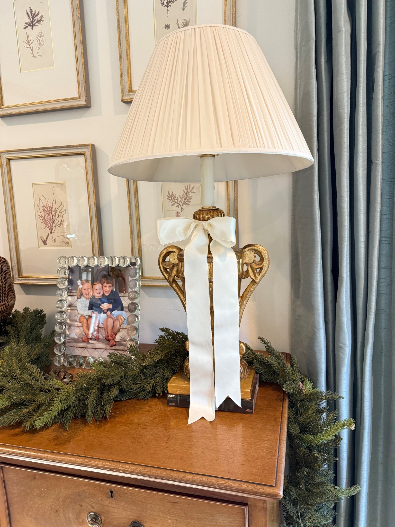 Faux Christmas garland that I’ve had for 5+ years! It’s a muted green and doesn’t look cheap. I also love the little pinecones for a touch of brown. Linking my picture frame too which is also on sale and makes a nice gift - especially for grandparents!

#LTKGiftGuide #LTKCyberWeek #LTKHoliday