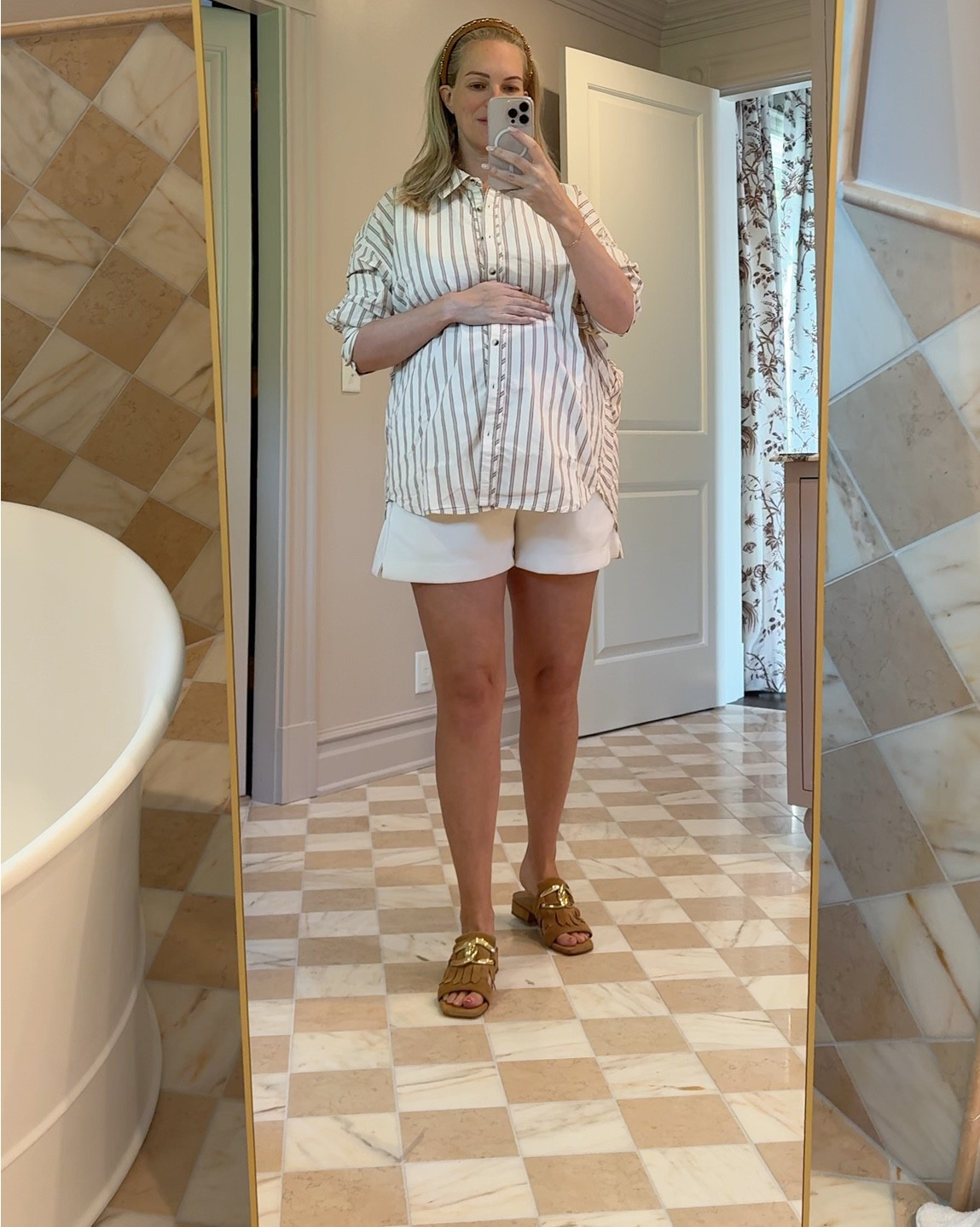 30 week bump #ootd! This oversized button down is such a chic statement for any fall wardrobe (and good for the pregnant belly haha), and i am living in these pull on shorts for $20! + a chic slide and headband for a pulled-together look that is easy & comfy 

#LTKBump #LTKSaleAlert #LTKFindsUnder100