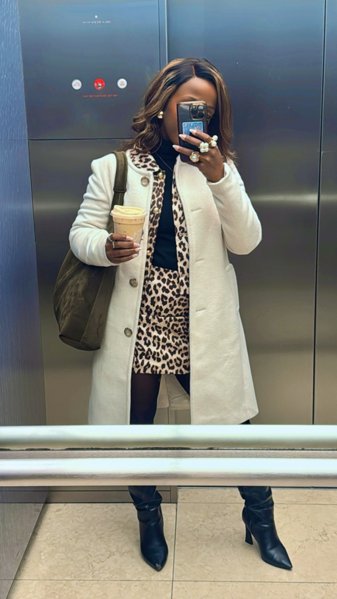 The elevator selfie is a must when the work outfit is this good 💁🏾‍♀️
Love this fall work outfit idea! Leopard print meets black turtleneck with some contrast added with the white wool coat. 

And my handy dandy Iced Pumpkin Spice Chai, of course! 

#LTKStyleTip #LTKFindsUnder100 #LTKWorkwear