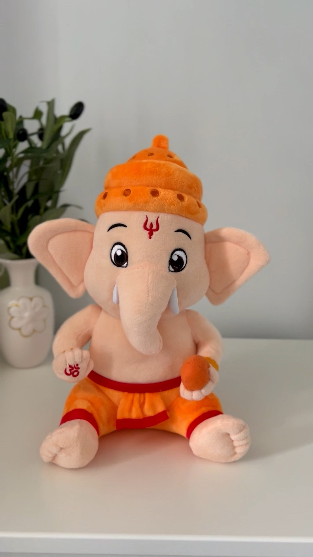 This 11” cuddly companion is more than just a plush—it’s a gateway to tradition and tranquility. 

Crafted with soft, hypoallergenic cotton and certified safe under ASTM F963-17 and CCPSA standards, it’s perfect for little hands and hearts. With a gentle press, it serenades your child with five soothing Sanskrit mantras. 

Ideal for nurseries, bedtime routines, or as a thoughtful gift for baby showers and cultural celebrations. 

#GaneshaPlush #CulturalGifts #BabyEssentials #SpiritualToys #CuddlyCompanion #ParentingWithPurpose 



#LTKbaby #LTKcanada #LTKgiftguide