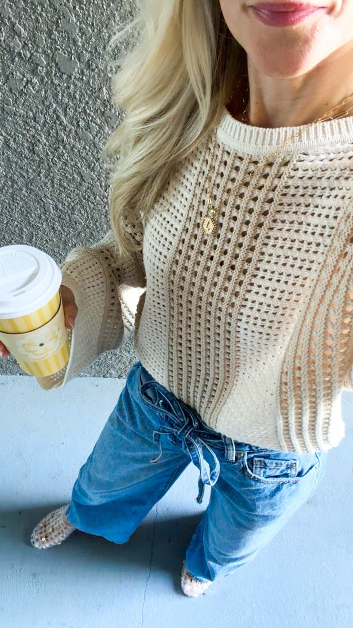 The perfect summer sweater. Open stitch detailing. Bell sleeves and would look great with white denim for a more dressed up look. Jelly slides are so comfy with seashell gold charms. 